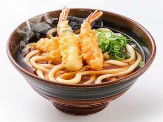 A steaming bowl of udon noodles in a savory broth with tempura shrimp, scallions, and kamaboko fish cake, served in a traditional Japanese bowl