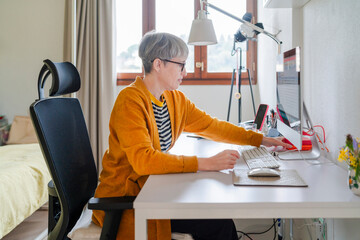 Freelancer Adjusting Computer Screen