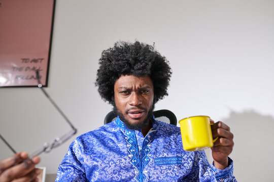 Businessman with a Displeased Expression during video call