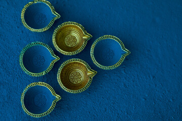 Closeup of empty oil Diya lamps