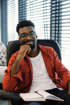 Startup Entrepreneur Strategizing in Office Space