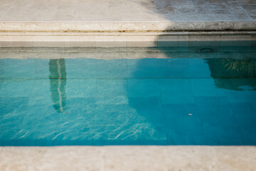 garden reflection in a swimming pool
