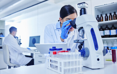 Microscope, scientist and research in lab with study for pathology, vaccine test and medical...