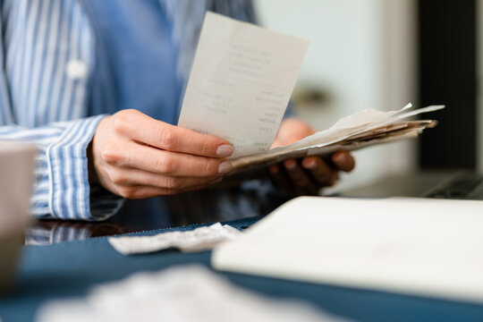 Receipts in women's hands