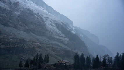 Tranquil Swiss mountain hut at dusk in the stunning Alpine landscape