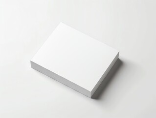 Blank white business card mockup on white background.