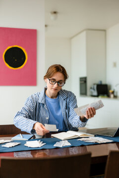 A woman considers the costs
