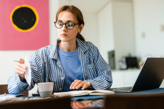 A woman considers the costs