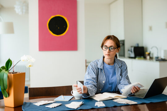 A woman considers the costs