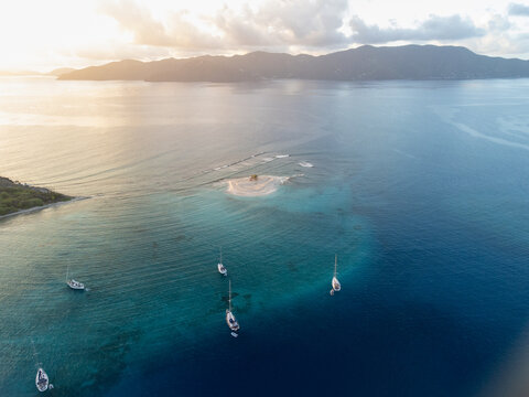 Sailboat Yachts at Secluded Caribbean Island Anchorage