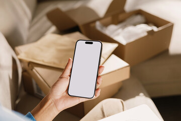 Mobile phone with white screen mockup and Unboxing at Modern Home
