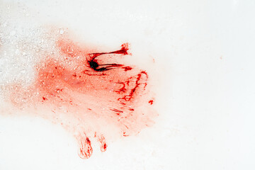 Menstrual blood being washed away