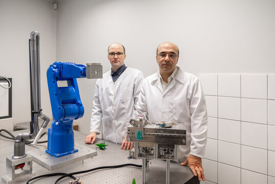 Scientists Portrait At Robotics Laboratory Room