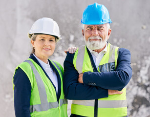 Mature, engineers and arms crossed on construction site in portrait with team of foreman in vest. Boss, supervisor and confidence for employee with helmet, architect or city planner with teamwork.