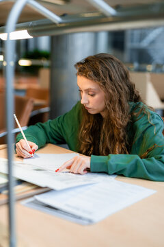 The woman at the desk in college