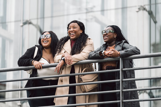 Three friends women looking away
