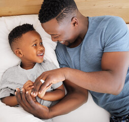 Black family, happy and father with son in bedroom for bonding, connection and love for child care...