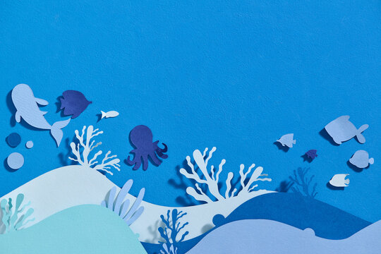 Paper-cut Ocean underwater on blue background