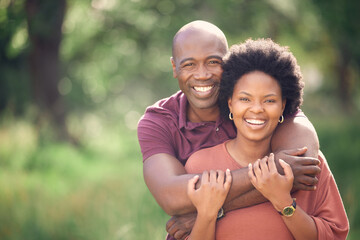 Black couple, hug and portrait in field for marriage, affection and support in outdoor nature to...