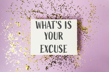 A white card with gold glitter on it that says Whats is your excuse