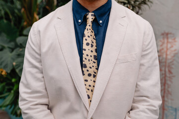 close up detail of grooms casual suit