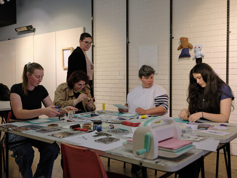 Art class with students at community arts centre run by vounteers