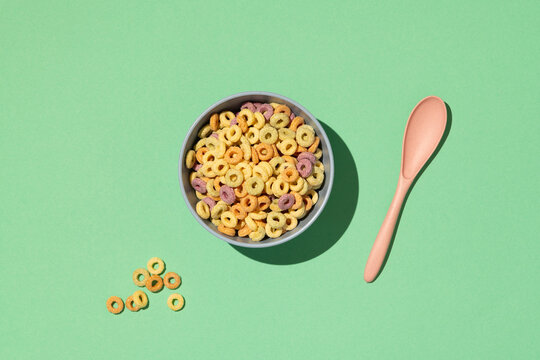 Colorful rings / loops breakfast cereal on blue background