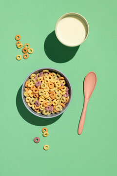 Colorful rings / loops breakfast cereal on blue background