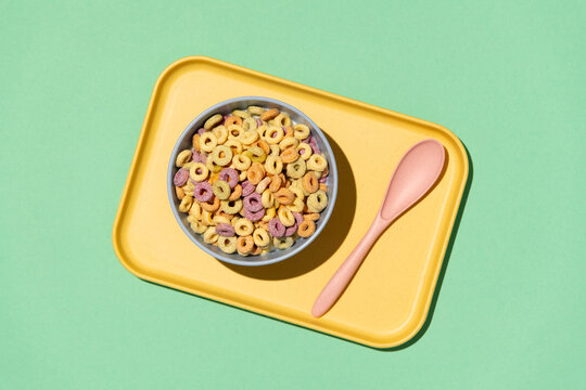 Colorful rings / loops breakfast cereal on blue background
