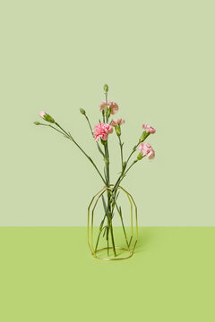 Chrysanthemum arrangement collected in empty vase made of metal straw