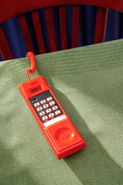 Red Telephone on Green Cloth