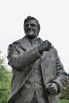Leeds United statue of their famous manager Don Revie celebrating outside the Elland Road ground. Leeds, UK 05 23 2024 