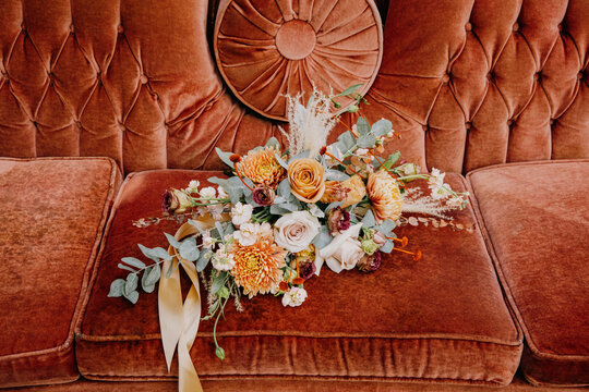 bouquet of flowers on couch