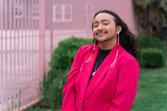 Trans Person Poses Outside for Portrait