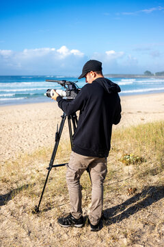 filmmaker shooting at the beach