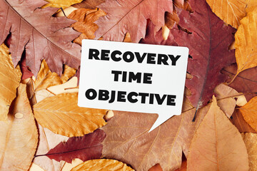 A white sign with the words Recovery Time Objective written on it is placed on