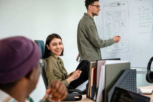 A group of people are developing a mobile application