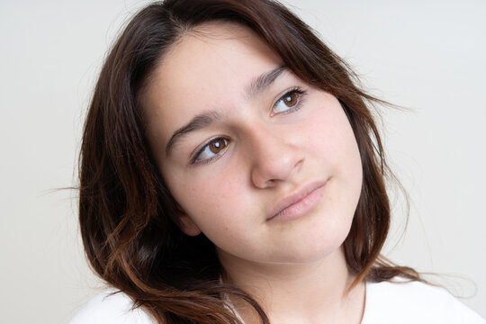 Contemplative Young Woman Looking Upward