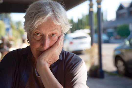 Portrait of senior transgender woman with pensive expression 