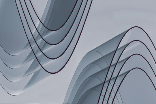 Abstract curved forms against a grey sky