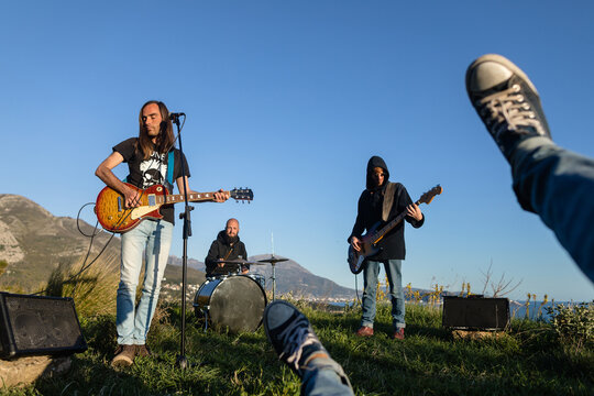 Photobombing during a rock band performance