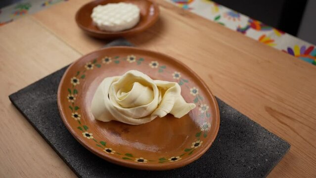 Mexican traditional creamy cheese from Oaxaca, mexico, quesillo