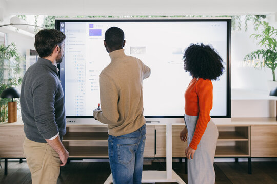 Team collaboration during a presentation at the office