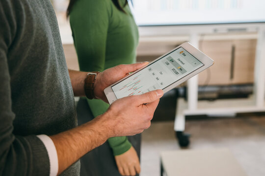 Analyzing data on a tablet in a business environment