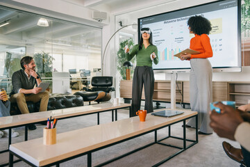 Team discussing metaverse trends in a tech presentation