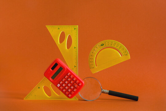 The set with a  hanging calculator and rulers