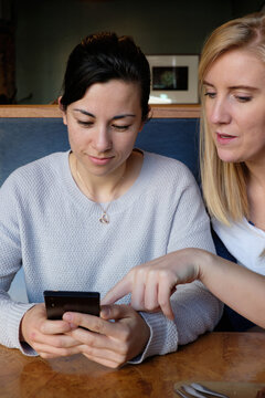 Young couple sharing social media posts