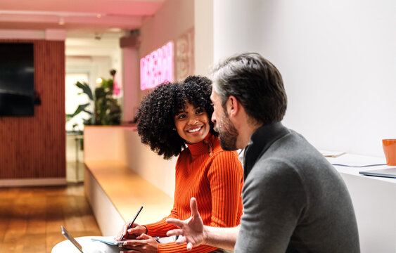 Engaged coworkers in a creative office setting