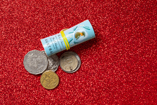 Australian cash on a textured red background