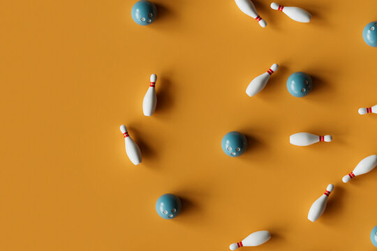 Multiple Bowling Balls and Pins on Orange Surface
